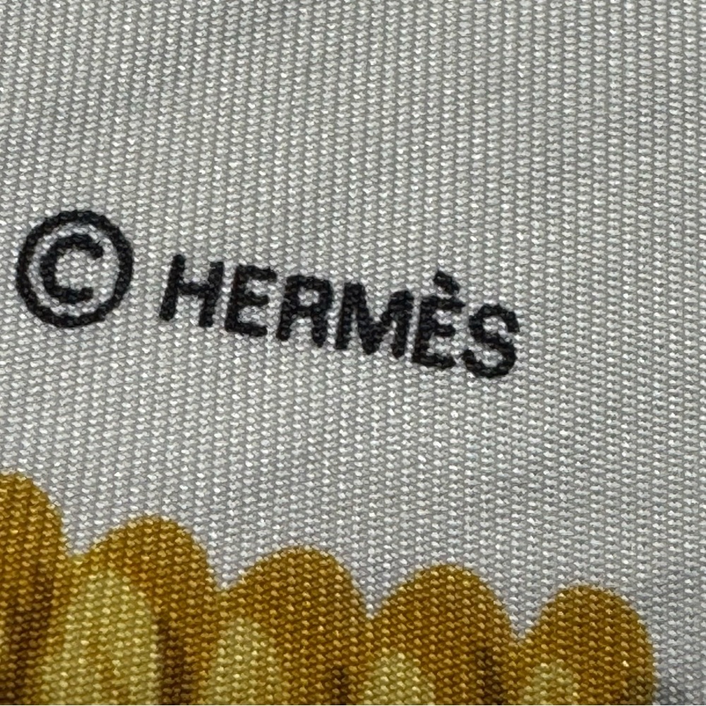 Hermes Scarf with White, Brown, and Gold Accents - Picture 10 of 16